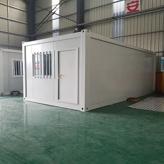 Casa de contenedores de paquete plano de sitio de construcción